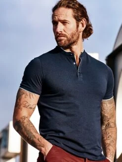 Stehkragenpolo Poseidon -Bekleidungsverkauf Geschäft EC23 7324 DE