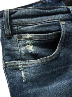 (Un)kaputtbare Jeans -Bekleidungsverkauf Geschäft EC24 6054 DG