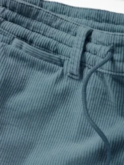 Tretarbeit-Cordshorts -Bekleidungsverkauf Geschäft EC24 6079 DH