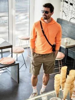 Abenteuerland-Shorts -Bekleidungsverkauf Geschäft EC24 6572 DE 1